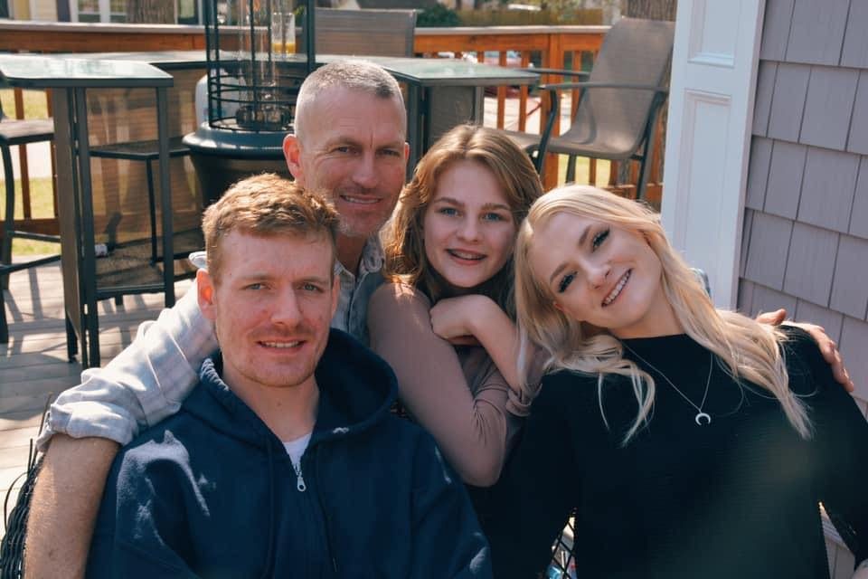 Eric Murray, owner of Murray Home Improvement, with his family