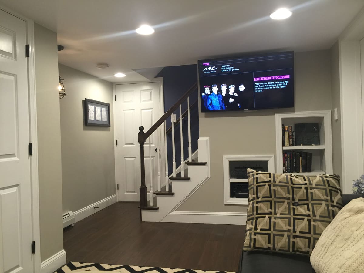 New stair, built-in shelves and TV wall