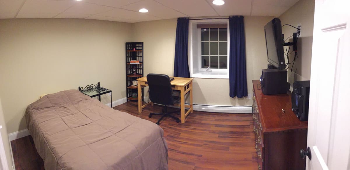 A bedroom and office space